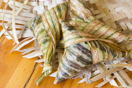 Sticky rice wrapped in triangular shapeの写真素材