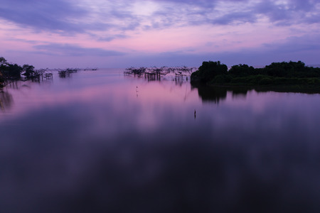 Silhouette of big fish net trapの写真素材