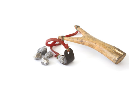 Catapult with shooting stone on white backgroundの写真素材