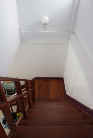 Wooden stairs of two-storey houseの写真素材
