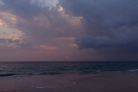 Sunset at Thaimuang Beach in Phang-Nga, Thailandの写真素材
