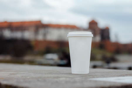 Coffee paper cup on castle background.の写真素材