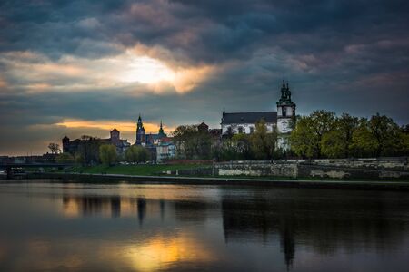 Dusk over the church on the Rock and Vistula river in Cracow, Polandの写真素材