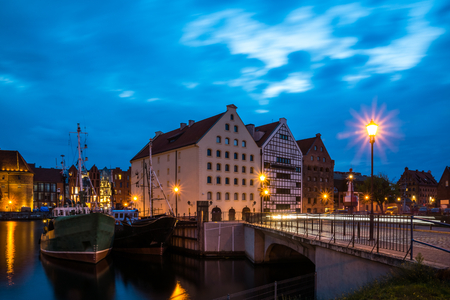 Historic buildings on Olowianka island at night in Gdansk, Pomorze, Poland