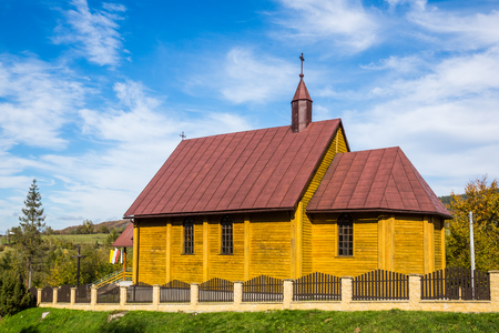 Wooden church of the Sacred Heart of Jesus in Lobozew Gorny, Bieszczady, Polandの写真素材