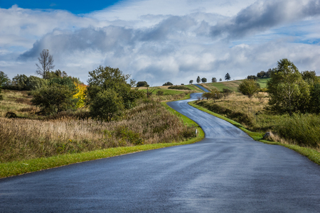 Mountain road in Czorsztyn in a cloudy day, Pieniny, Polandの写真素材