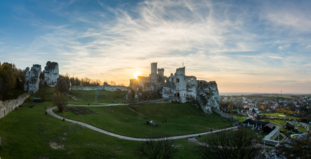 Sunset over the ruins of medieval castle Ogrodzieniec in Podzamcze, Silesia, Polandのeditorial素材