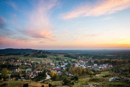 Sunset over limestone rocks and Olsztyn city near Czestochowa, Silesia, Polandの写真素材