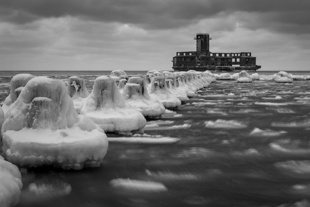 Frozen Baltic sea and ruins old military building in Babie Doly, Gdynia, Polandの写真素材