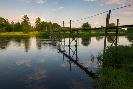 Footbridge over the Pilica river near Sulejow, Lodzkie, Polandの写真素材