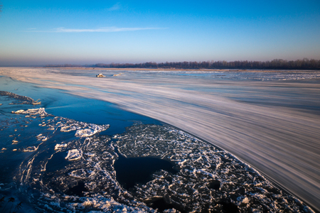 Frazil ice on the Vistula river in frosty morning, Polandの写真素材