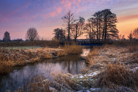 Sunrise over the Jeziorka river near Piaseczno, Polandの写真素材
