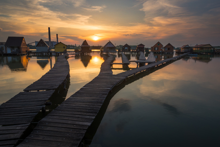 Wooden cottages on the Bokod lake in Hungaryの写真素材