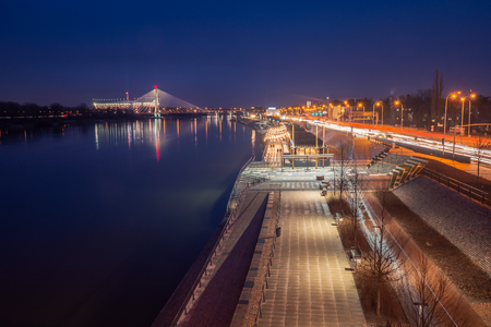 Vistula boulevards at night in Warsaw city, Polandの写真素材