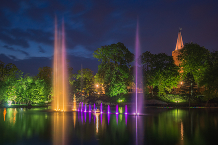 Piastowska tower and fountain in the castle pond at night in Opole, Opolskie, Polandのeditorial素材