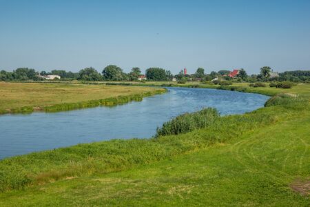 Warta river as sunny day near Kolo city, Poland
