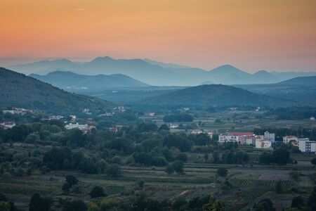 Sunset over the Dinaric Alps in Medjugorje, Bosnia and Herzegovinaの写真素材