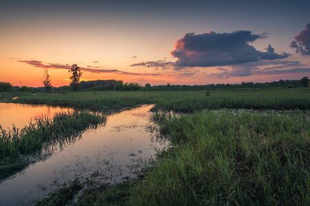 Sunset over the Bzura river near Kamion, Masovia, Polandの写真素材