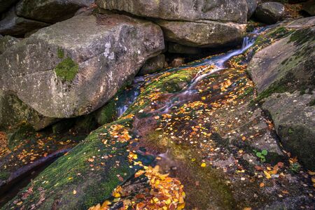 Waterfall Kaskady Myi in autumn in Sudety mountains, Przesieka, Polandの写真素材