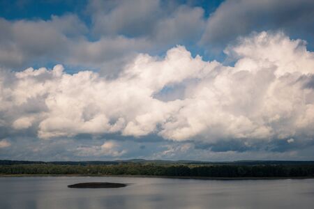 Pozezdrze lake and beautiful cloud at autumn, Warminsko- Mazurskie, Polandの写真素材