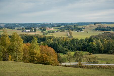 Autumn view of the meadows and forests on Suwalszczyzna near Wizajny, Podlaskie, Polandの写真素材