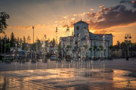 Sunset over the main square in Piaseczno city, Poland