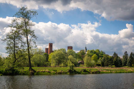 Castle and Czerskie lake at sunny spring day in Czersk, Polandのeditorial素材