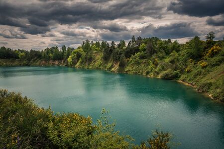 Turquoise lake Wapienniki near Sulejow, Lodzkie, Polandの写真素材