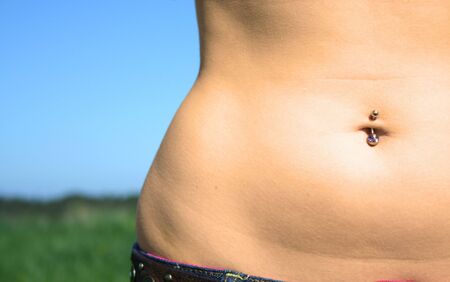 Piercing in stomachの写真素材