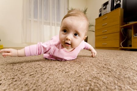 Baby heaving fun in homeの写真素材