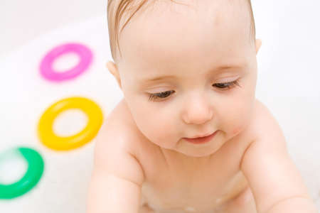 Sweet baby girl in bath