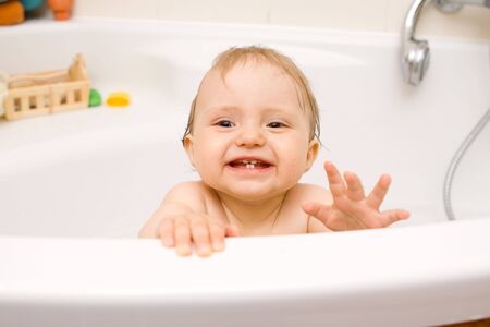 Sweet baby girl in bath