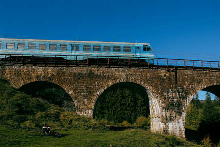 train is going on historic viaductの写真素材