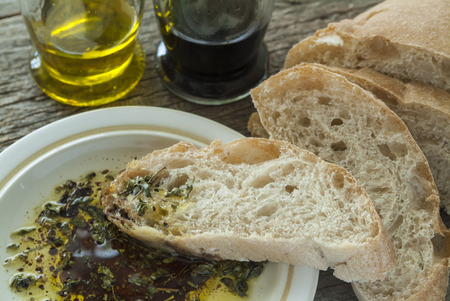 Sliced Ciabatta bread with olive oil and balsamic vinegar.の写真素材