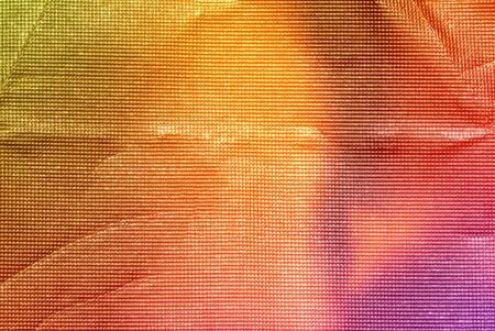Close up of colorful, textured foilの写真素材