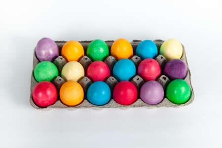 Painted Easter eggs in egg box
Multicolored, painted Easter eggs in egg box on white background and copy spaceの写真素材