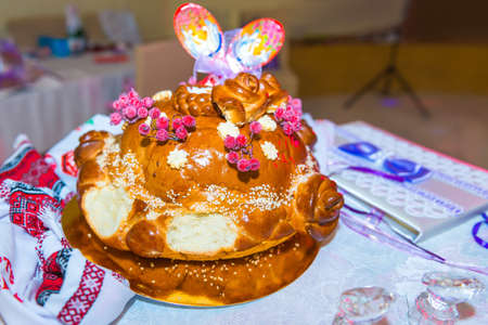 Wedding bread on the table with invitation
