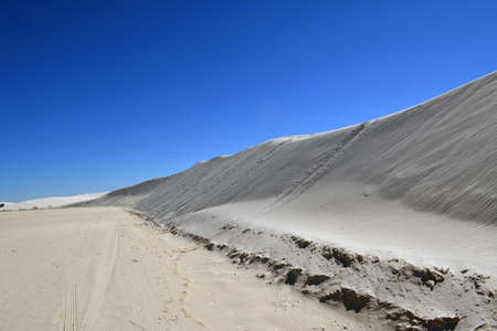 Sand dune hill on a clear sunny day