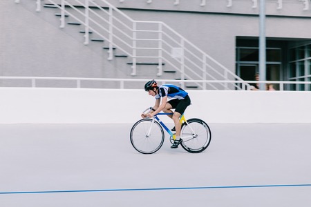 A cyclist rides an outdoor bike trail. Training before the competitionの写真素材