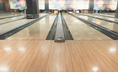Empty yellow track for bowling. Active leisure for bowlingの写真素材