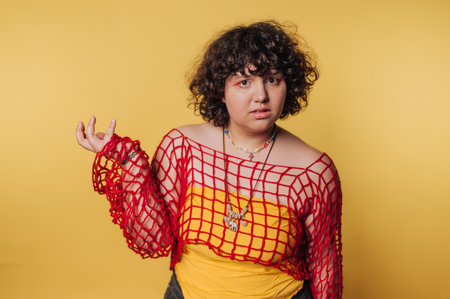 Unique fashion expression in studio with vibrant colors and bold styles during a creative photoshootの写真素材