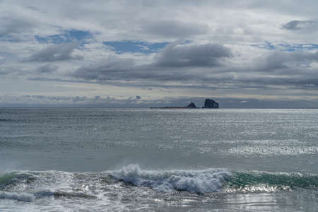 Panoramic view of the sea, blue sky and clouds.