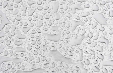 Rain water drops on metal surfaceの写真素材