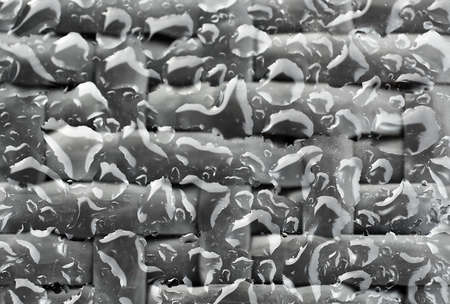 Rain water drops on glass surfaceの写真素材