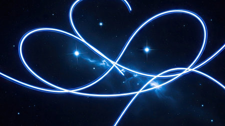 Illuminated neon light trails form abstract shapes on a deep blue backdrop. The image showcases vibrant, glowing lines against a dark background. The composition employs bright colors and contrasting elements. Suitable for visual concepts related to technology, energy, or design projects. Could be used for commercial or editorial applications.の素材