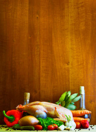  Raw chicken surrounded by vegetables                              の写真素材