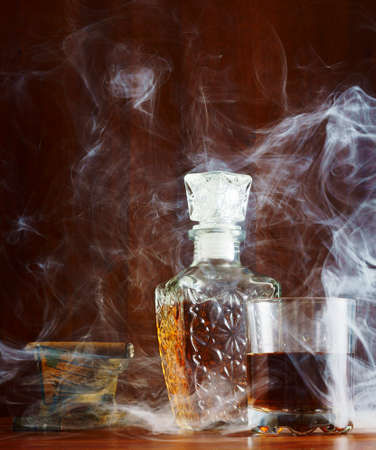 Eau-de-vie in the smoke cigars                               