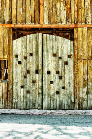 Wooden, very old barn gateの写真素材
