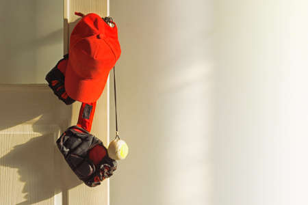 Sports equipment hanging on the door after a workout