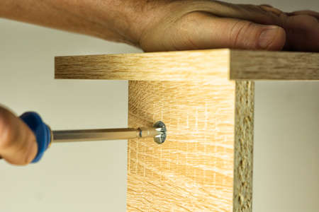 Installing a threaded furniture fastener